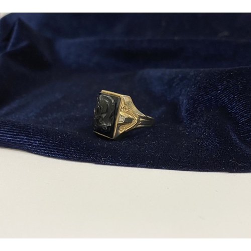 66 - AN EXCELLENT GOLD, DIAMOND & CARVED BLACK ONYX INTAGLIO SIGNET RING, with rectangular carved black o... 