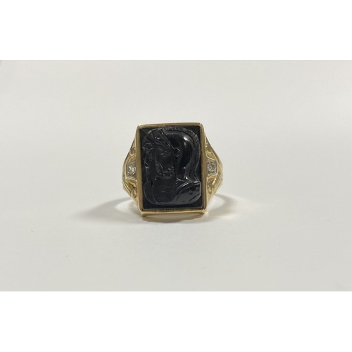 66 - AN EXCELLENT GOLD, DIAMOND & CARVED BLACK ONYX INTAGLIO SIGNET RING, with rectangular carved black o... 