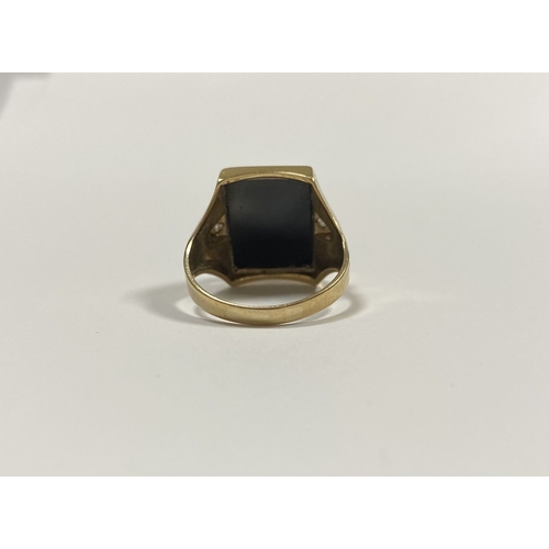 66 - AN EXCELLENT GOLD, DIAMOND & CARVED BLACK ONYX INTAGLIO SIGNET RING, with rectangular carved black o... 