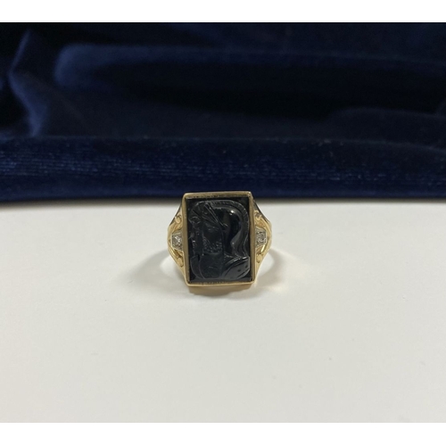 66 - AN EXCELLENT GOLD, DIAMOND & CARVED BLACK ONYX INTAGLIO SIGNET RING, with rectangular carved black o... 