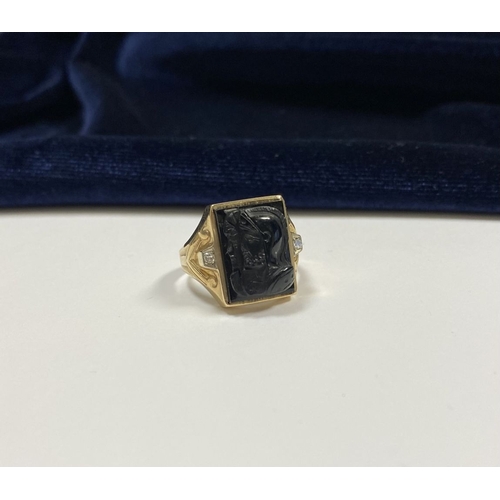 66 - AN EXCELLENT GOLD, DIAMOND & CARVED BLACK ONYX INTAGLIO SIGNET RING, with rectangular carved black o... 