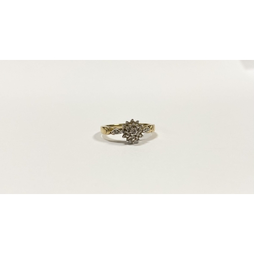 76 - A BEAUTIFUL 9CT YELLOW GOLD DIAMOND CLUSTER RING, with central round cut diamond surrounded by two r... 