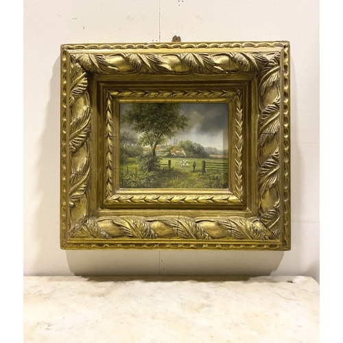 8 - AN EARLY 20TH CENTURY RURAL LANDSCAPE IN HIGHLY DECORATIVE GILT FRAME, oil on board, depicting rural... 