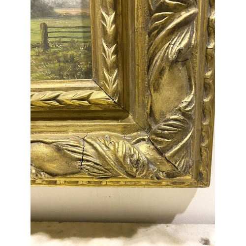 8 - AN EARLY 20TH CENTURY RURAL LANDSCAPE IN HIGHLY DECORATIVE GILT FRAME, oil on board, depicting rural... 