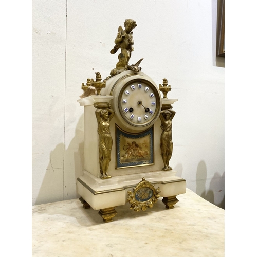 80 - A 19TH CENTURY FRENCH STYLE ORMOLU MARBLE MANTLE CLOCK, the circular dial on marble with painted por... 