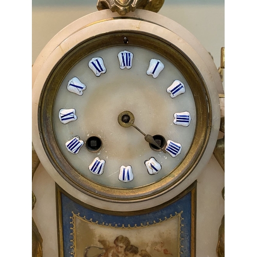 80 - A 19TH CENTURY FRENCH STYLE ORMOLU MARBLE MANTLE CLOCK, the circular dial on marble with painted por... 