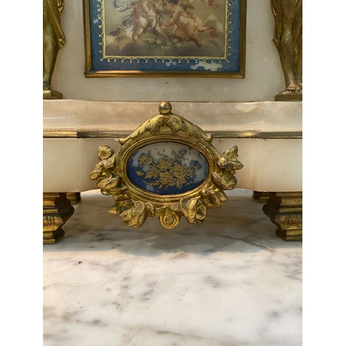 80 - A 19TH CENTURY FRENCH STYLE ORMOLU MARBLE MANTLE CLOCK, the circular dial on marble with painted por... 