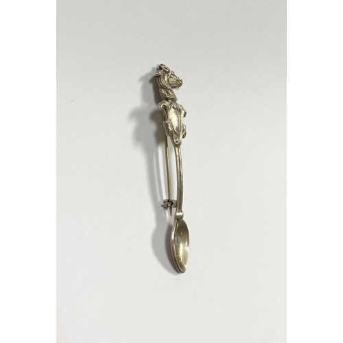 96 - A CHARMING STERLING SILVER SOUVENIR SPOON BROOCH, the handle mounted with blank cartouche below hors... 