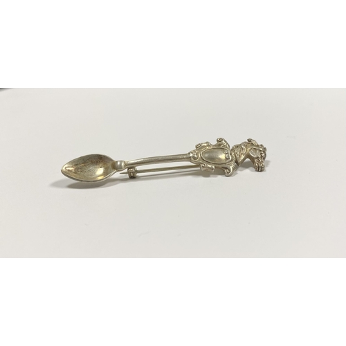 96 - A CHARMING STERLING SILVER SOUVENIR SPOON BROOCH, the handle mounted with blank cartouche below hors... 