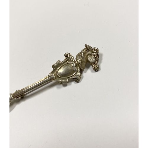 96 - A CHARMING STERLING SILVER SOUVENIR SPOON BROOCH, the handle mounted with blank cartouche below hors... 