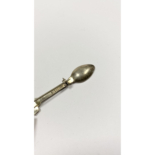 96 - A CHARMING STERLING SILVER SOUVENIR SPOON BROOCH, the handle mounted with blank cartouche below hors... 