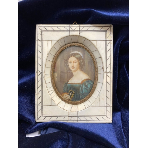 11 - A FRAMED 19TH CENTURY MINIATURE PORTRAIT, framed in a ‘Piano Key’ bone frame, with oval brass border... 