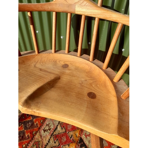 116 - AN EXCELLENT QUALITY HANDMADE ELM ARMCHAIR, in the style of Welsh stick chairs. With narrow four spi... 