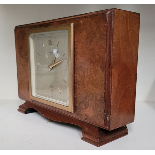 117 - A GOOD QUALITY VINTAGE BURR WALNUT ELLIOTT OF LONDON FOR F. BRENNAN CORK MANTEL CLOCK, a good vintag... 