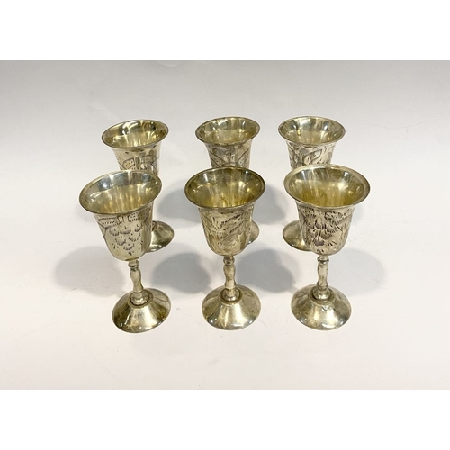 132 - A CASED SET OF SIX SILVER PLATED GOBLETS, each with flared rim, the body with nice etched design, ra... 