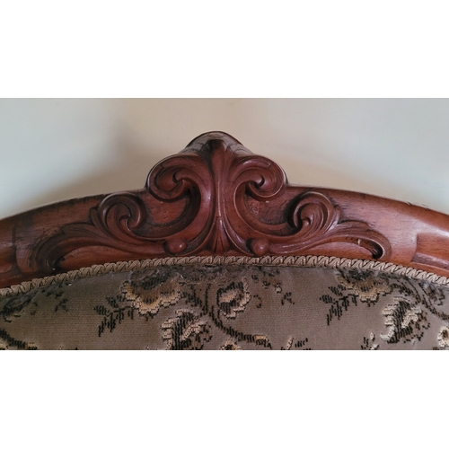 143 - A GOOD QUALITY LATE 19TH CENTURY MAHOGANY FRAMED FOUR PERSON SETTEE, with serpentine shaped back dec... 