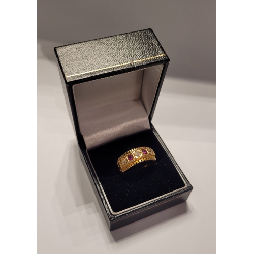 16 - A LOVELY ANTIQUE 18CT YELLOW GOLD RUBY AND DIAMOND RING, in the Georgian style, with three round cut... 