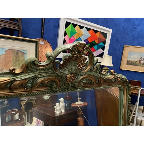 164 - AN ORNATE GILT & GREEN PAINTED OVERMANTLE/HALL MIRROR, with multiple carved borders surrounding mirr... 