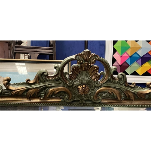 164 - AN ORNATE GILT & GREEN PAINTED OVERMANTLE/HALL MIRROR, with multiple carved borders surrounding mirr... 