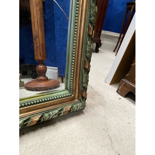 164 - AN ORNATE GILT & GREEN PAINTED OVERMANTLE/HALL MIRROR, with multiple carved borders surrounding mirr... 