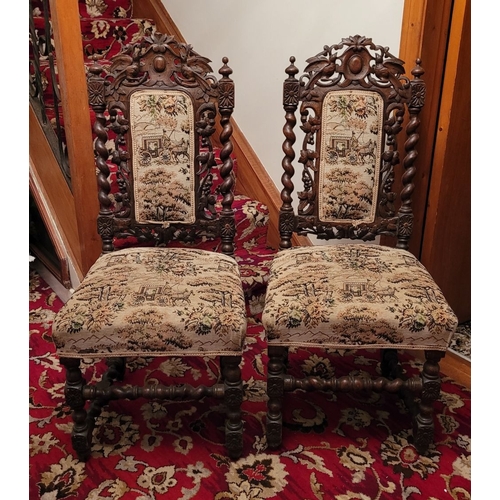 173 - A VERY GOOD PAIR OF HAND CARVED OAK HENRY II STYLE DINING CHAIRS / SIDE CHAIRS, the backs decorated ... 