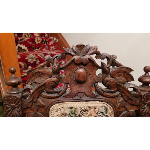 173 - A VERY GOOD PAIR OF HAND CARVED OAK HENRY II STYLE DINING CHAIRS / SIDE CHAIRS, the backs decorated ... 