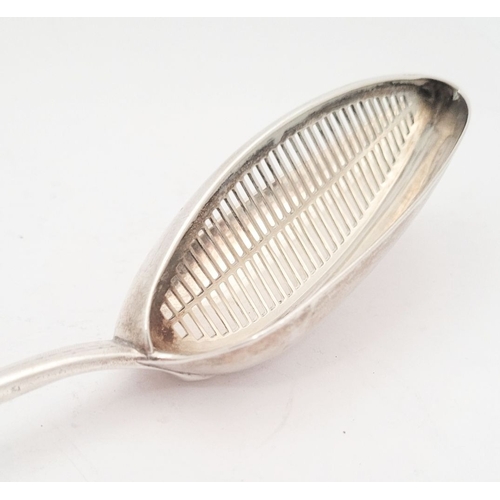 18 - A VERY FINE GEORGE III SILVER STRAINER SPOON, London, date letter for 1792, and maker’s mark for Geo... 