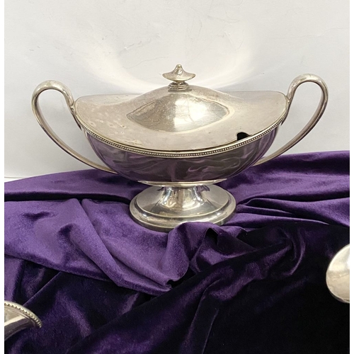 189 - A VINTAGE SILVER PLATED TUREEN AND PAIR OF SAUCE BOATS, each with beaded border to rim, the tureen w... 