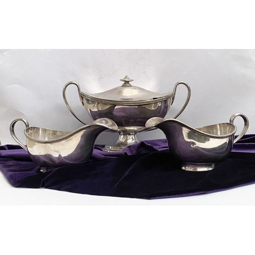 189 - A VINTAGE SILVER PLATED TUREEN AND PAIR OF SAUCE BOATS, each with beaded border to rim, the tureen w... 