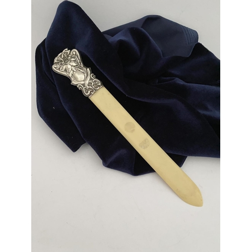 19 - AN ART NOUVEAU SILVER MOUNTED PAPER KNIFE/LETTER OPENER, c.1902. The silver mount with intricate Art... 