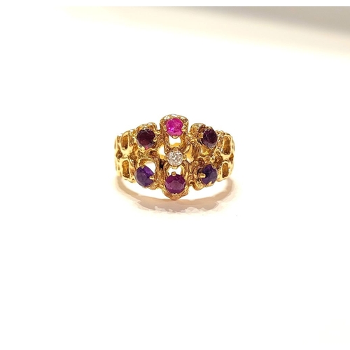 20 - AN EYE CATCHING 9CT YELLOW GOLD MULTI STONE CLUSTER / COCKTAIL RING, with pierced band & shank set w... 