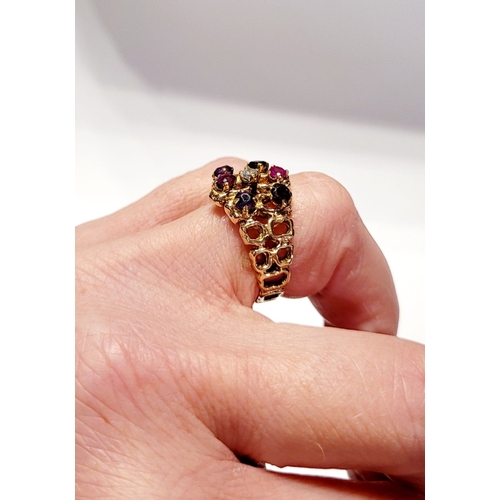 20 - AN EYE CATCHING 9CT YELLOW GOLD MULTI STONE CLUSTER / COCKTAIL RING, with pierced band & shank set w... 