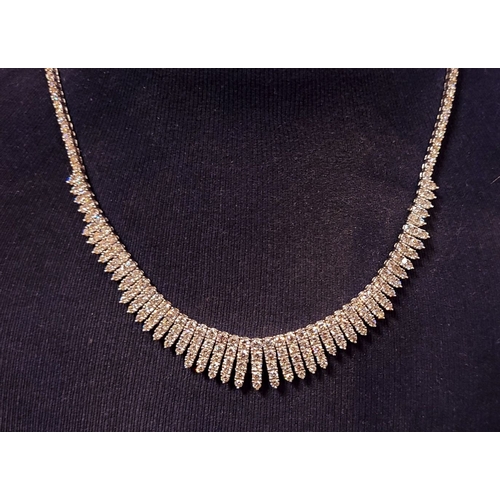 24 - A STUNNING 18CT WHITE GOLD DIAMOND ENCRUSTED FRINGE STYLE NECKLACE, encrusted with approximately 26c... 