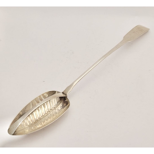 33 - A VERY GOOD IRISH GEORGE III SILVER STRAINER SPOON, with maker’s mark of John Shields. Circa 1802. E... 