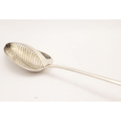 33 - A VERY GOOD IRISH GEORGE III SILVER STRAINER SPOON, with maker’s mark of John Shields. Circa 1802. E... 