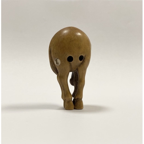 35 - AN ANTIQUE HAND CARVED JAPANESE BOXWOOD NETSUKE, in the form of a horse, signed to reverse on inlaid... 