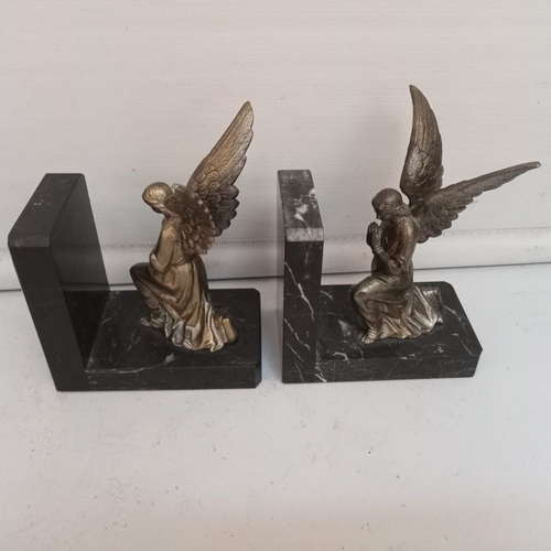 45 - A PAIR OF ART DECO WINGED ANGEL MANTELPIECE ORNAMENTS / BOOKENDS, Pair Art Deco circa 1930s, 12cm lo... 