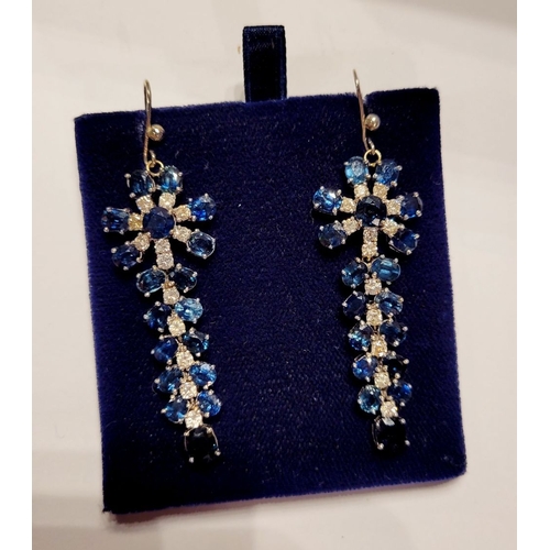 50 - A FANTASTIC PAIR OF WHITE GOLD BLUE SAPPHIRE & DIAMOND DROP EARRINGS, each with a starburst style de... 