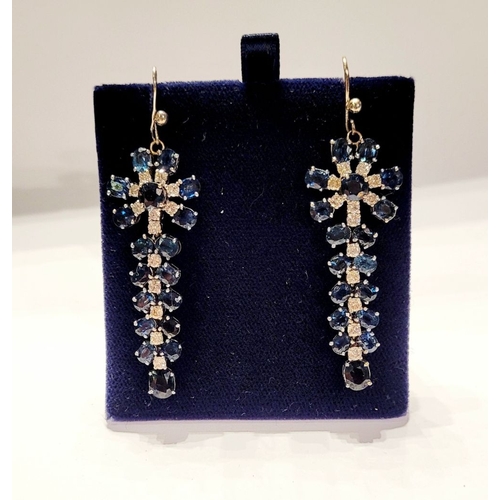 50 - A FANTASTIC PAIR OF WHITE GOLD BLUE SAPPHIRE & DIAMOND DROP EARRINGS, each with a starburst style de... 