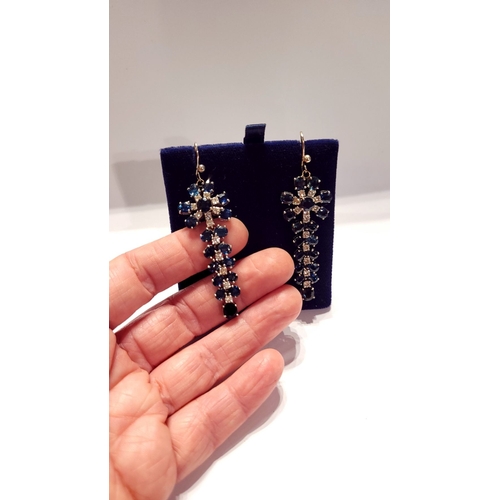 50 - A FANTASTIC PAIR OF WHITE GOLD BLUE SAPPHIRE & DIAMOND DROP EARRINGS, each with a starburst style de... 