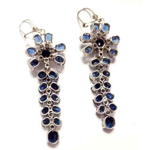 50 - A FANTASTIC PAIR OF WHITE GOLD BLUE SAPPHIRE & DIAMOND DROP EARRINGS, each with a starburst style de... 