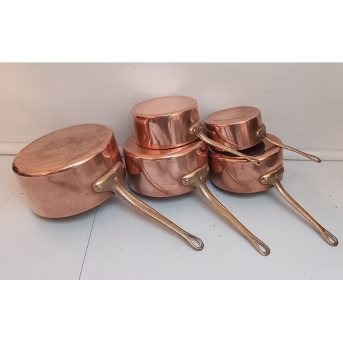 62 - A SET 5 VINTAGE COPPER PANS the largest 20cm diameter.