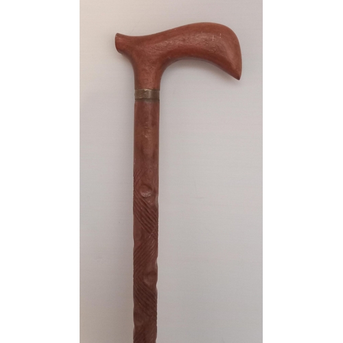 66 - A CARVED VINTAGE SWORDSTICK, Dimensions: 86cm long overall.