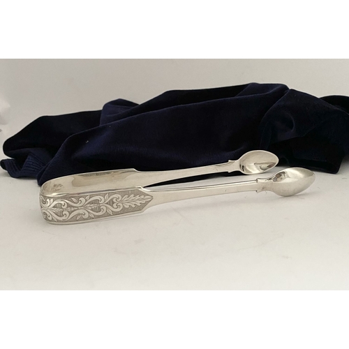 7 - A GEORGE III DUBLIN SILVER SUGAR TONGS, by Matthew West & James England, Dublin c.1818. In the fiddl... 