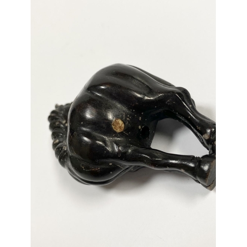 8 - AN ANTIQUE HAND CARVED JAPANESE WOOD NETSUKE, in the form of a horse, signed to reverse on inlaid bo... 