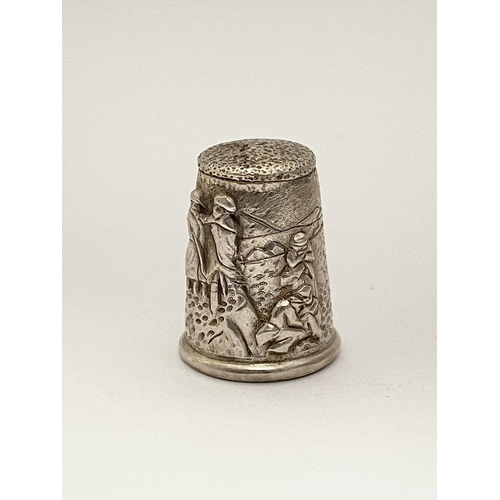 102 - A DECORATIVE SILVER EMBOSSED THIMBLE, Hallmarked GJD, London c.1992. This thimble is a later reissue... 