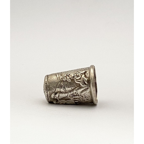 102 - A DECORATIVE SILVER EMBOSSED THIMBLE, Hallmarked GJD, London c.1992. This thimble is a later reissue... 