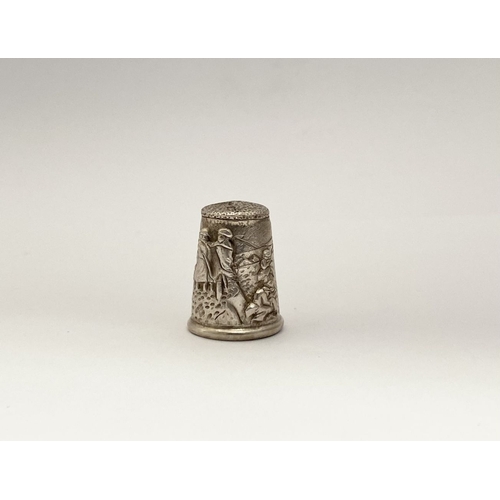 102 - A DECORATIVE SILVER EMBOSSED THIMBLE, Hallmarked GJD, London c.1992. This thimble is a later reissue... 