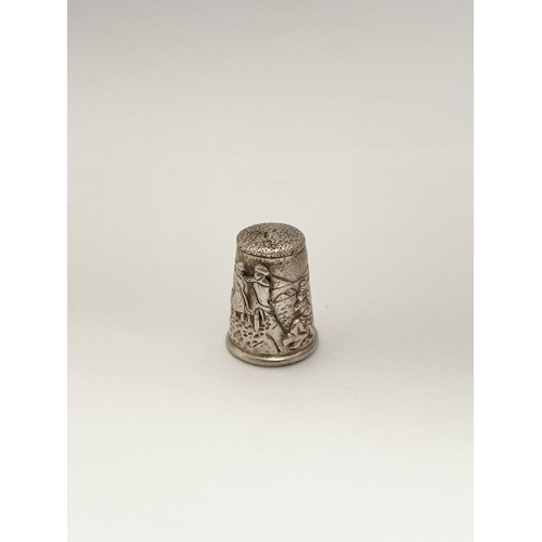 102 - A DECORATIVE SILVER EMBOSSED THIMBLE, Hallmarked GJD, London c.1992. This thimble is a later reissue... 