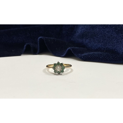 108 - A GEMSET GOLD & SILVER FLOWER RING, with central round cut clear gemstone surrounded by eight round ... 